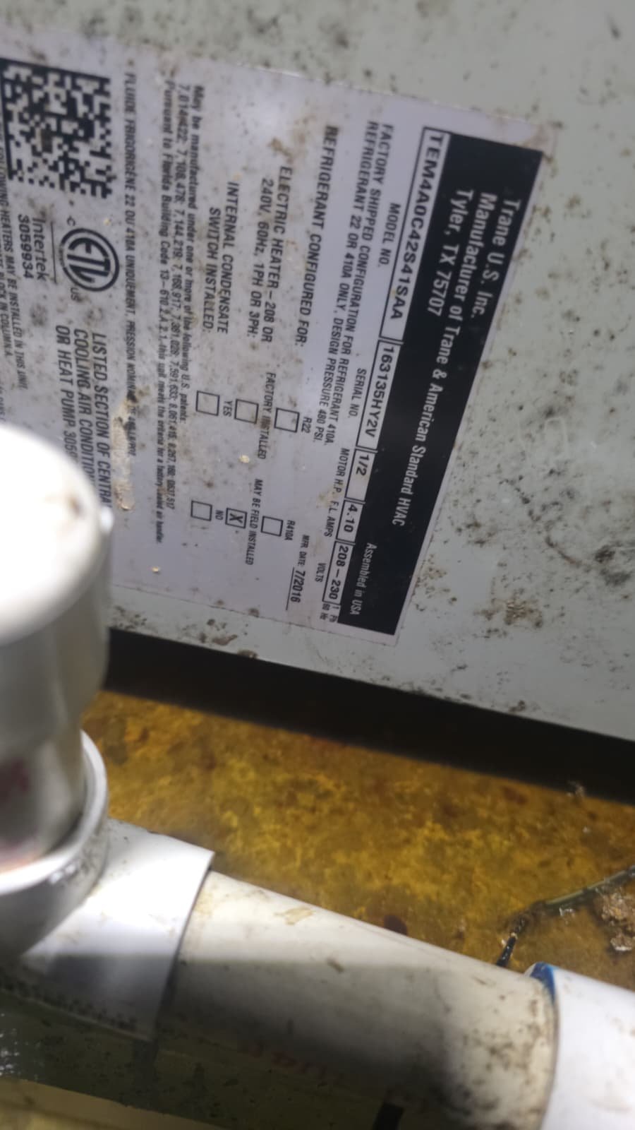 HVAC Label Detail - Tampa, FL 33614 Close-up of HVAC equipment manufacturer's label, Tampa, FL 33614.