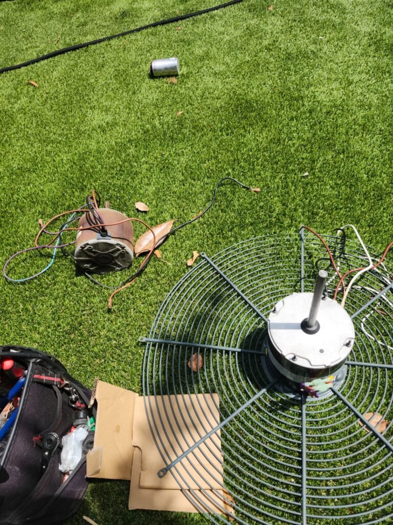 HVAC repair components on grass in Tampa, FL 33609