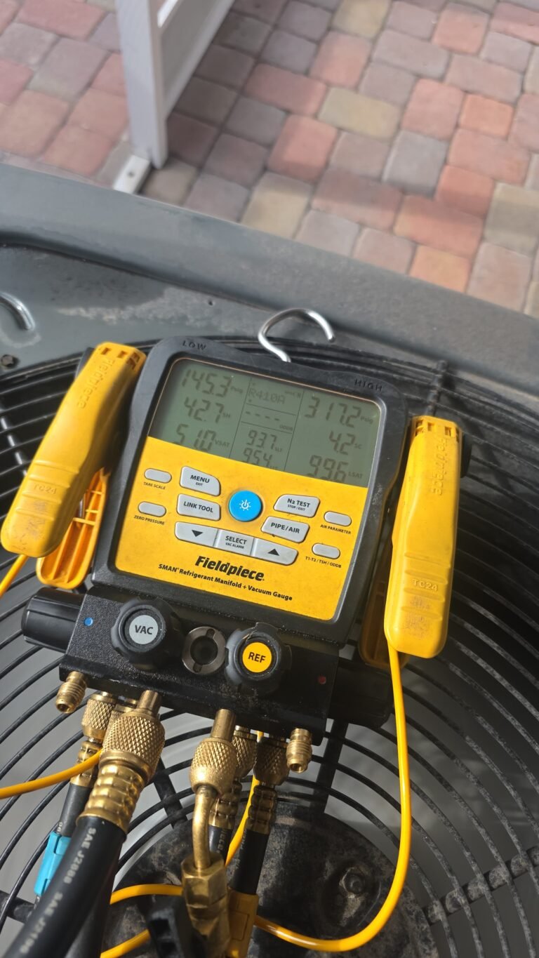HVAC Service with Digital Gauge in Brandon, FL 33511 Digital manifold gauge on HVAC unit during service in Brandon, FL 33511