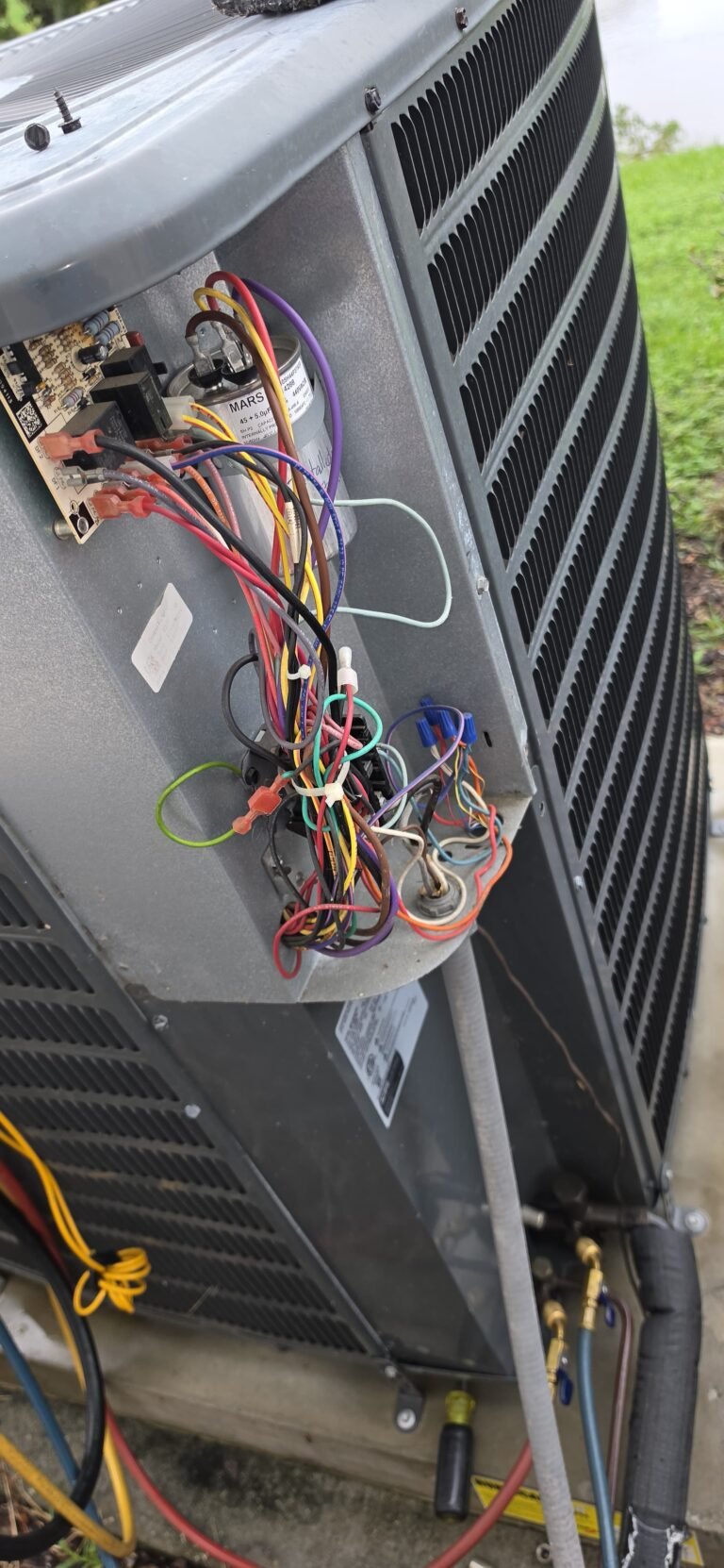 HVAC unit with exposed wiring in Tampa, FL 33610