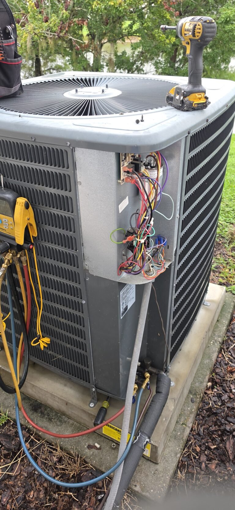 HVAC unit with exposed wiring in Tampa, FL 33610