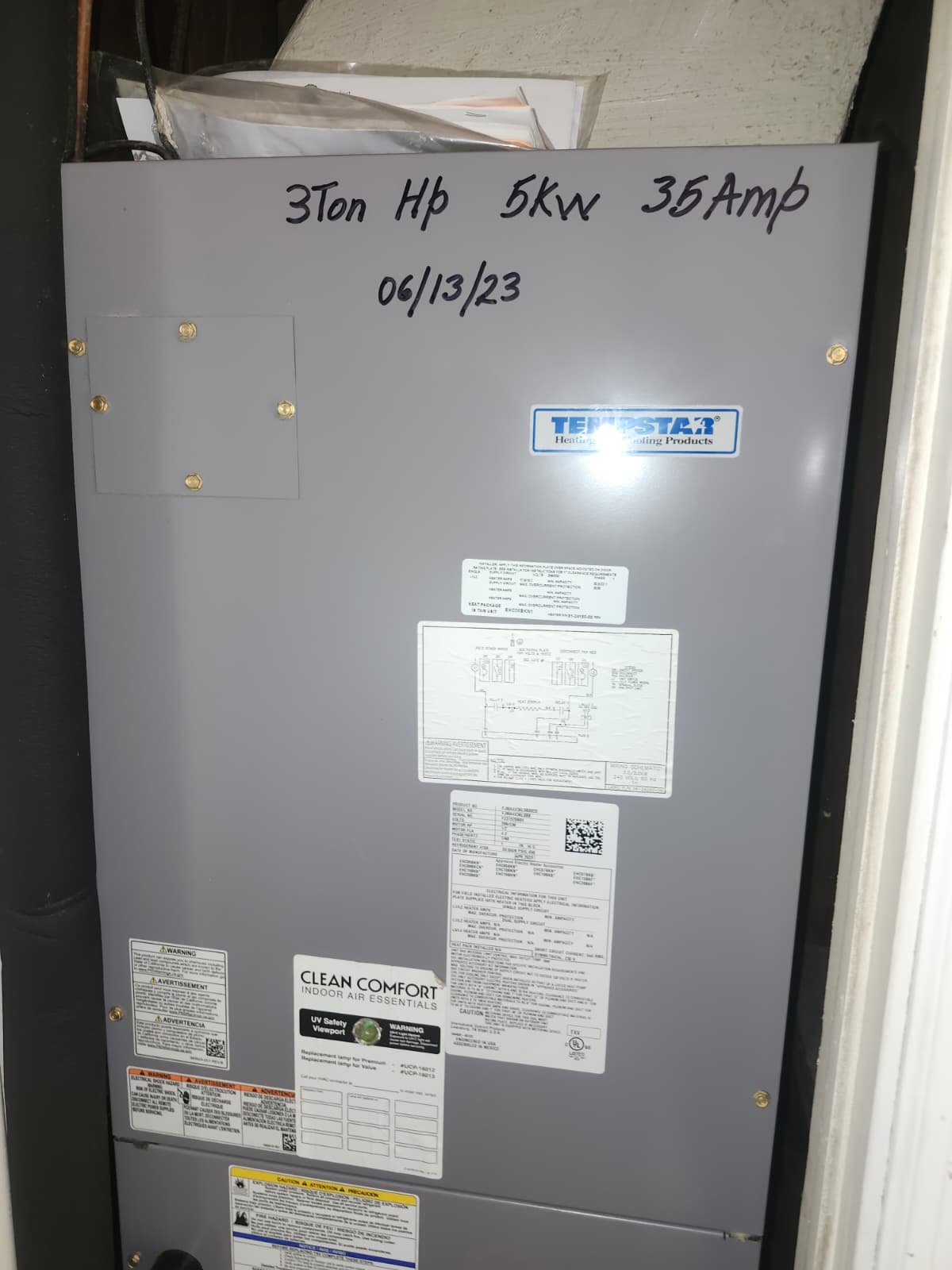 HVAC Specifications - Tampa, FL 33614 HVAC unit with handwritten specifications on the casing in Tampa, FL 33614. Equipment detail.
