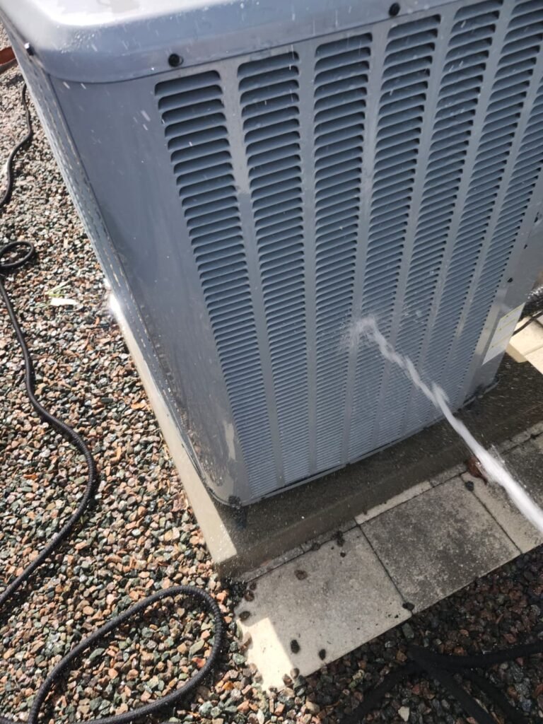 HVAC Unit Cleaning Process in Largo, FL 33774 HVAC unit being cleaned with water in Largo, FL 33774