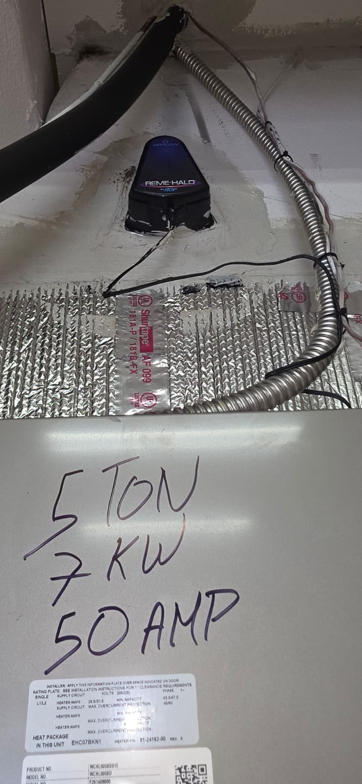 HVAC unit label and wiring showing specifications in Lutz, FL 33559.