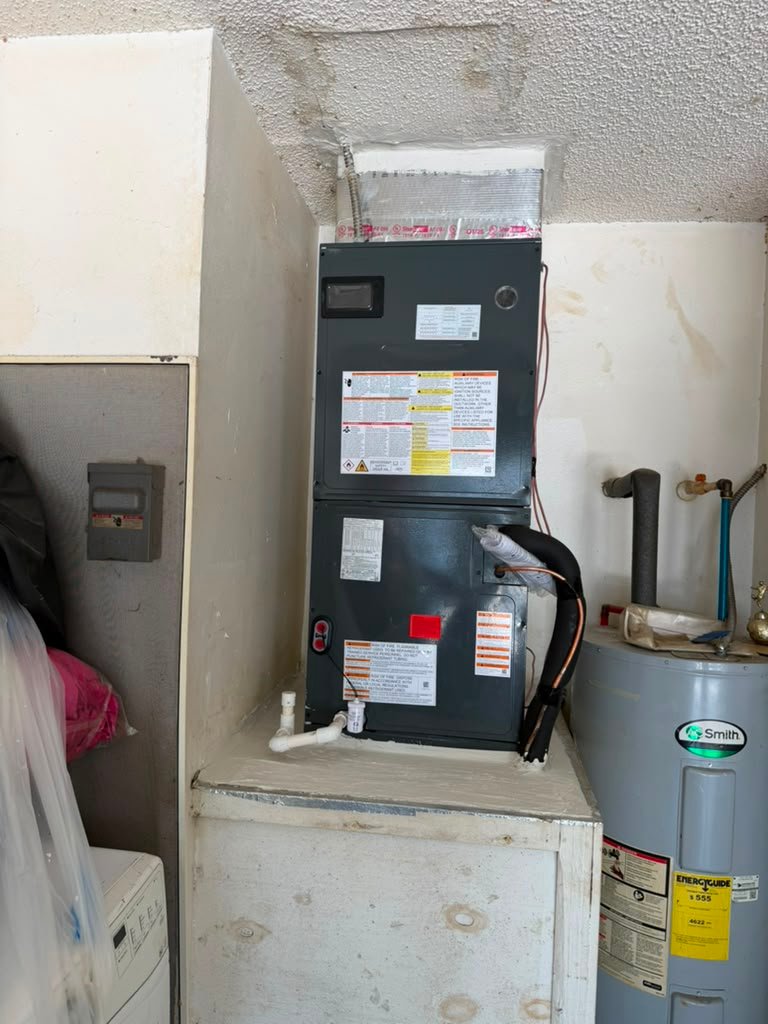 Installed HVAC unit in utility room in Wesley Chapel, FL 33545. Efficient heating and cooling.