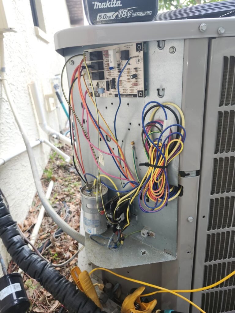 HVAC unit with exposed wiring in Holiday, FL 34691