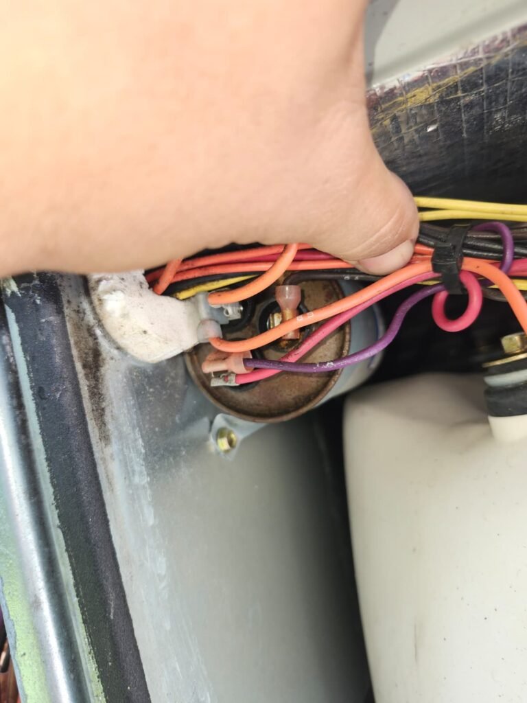 Close-up of HVAC wiring during maintenance in Tampa, FL 33609