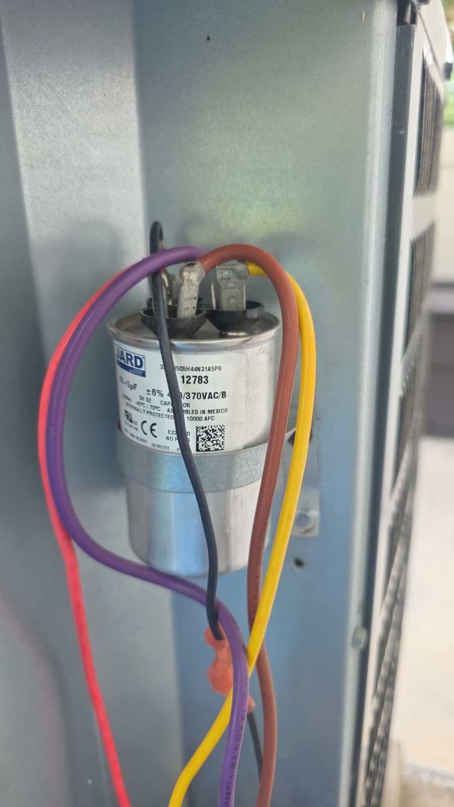Installed Capacitor in HVAC, Palm Harbor, FL 34684 Close-up of installed capacitor in HVAC unit, Palm Harbor, FL 34684.