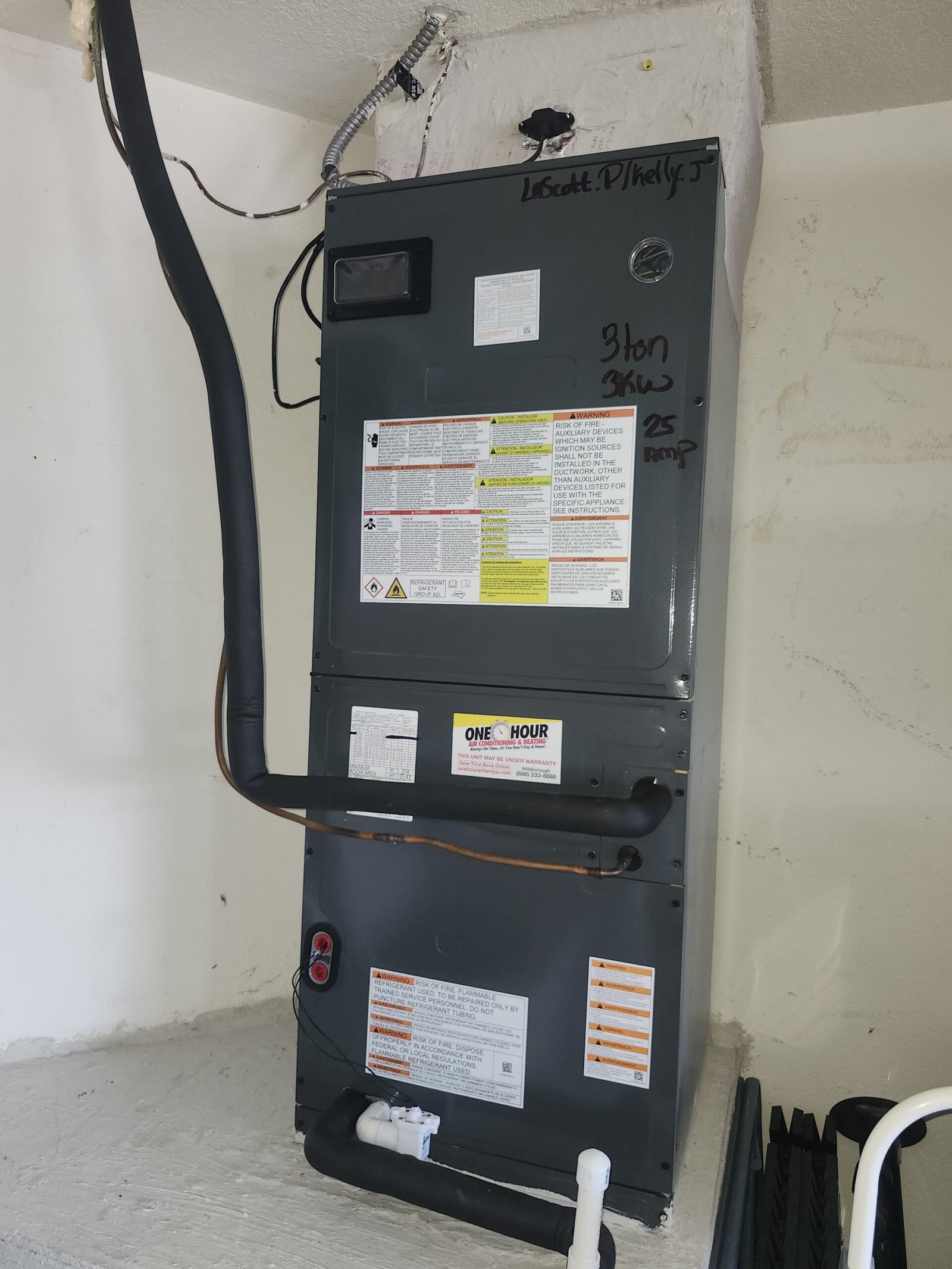 Installed HVAC unit with labels, free diagnosis in Brandon, FL 33511.