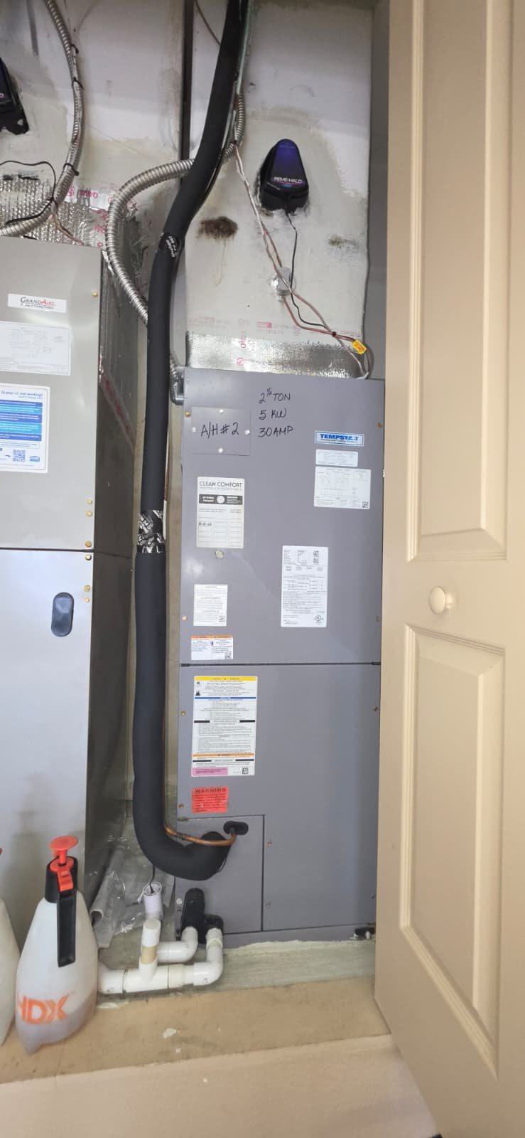 Installed HVAC unit in utility closet in Lutz, FL 33559 after Visit #4.