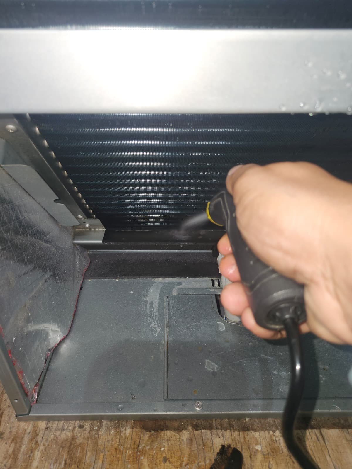 Interior HVAC Cleaning in Tarpon Springs, FL 34688 Interior HVAC unit cleaning with water spray in Tarpon Springs, FL 34688. Comprehensive HVAC service.