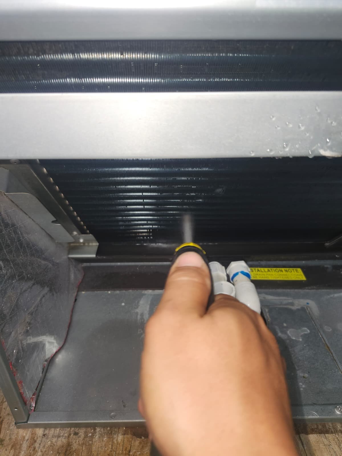 Interior HVAC Unit Cleaning in Tarpon Springs, FL 34688 Interior HVAC unit cleaning with water spray in Tarpon Springs, FL 34688. Reliable HVAC maintenance.