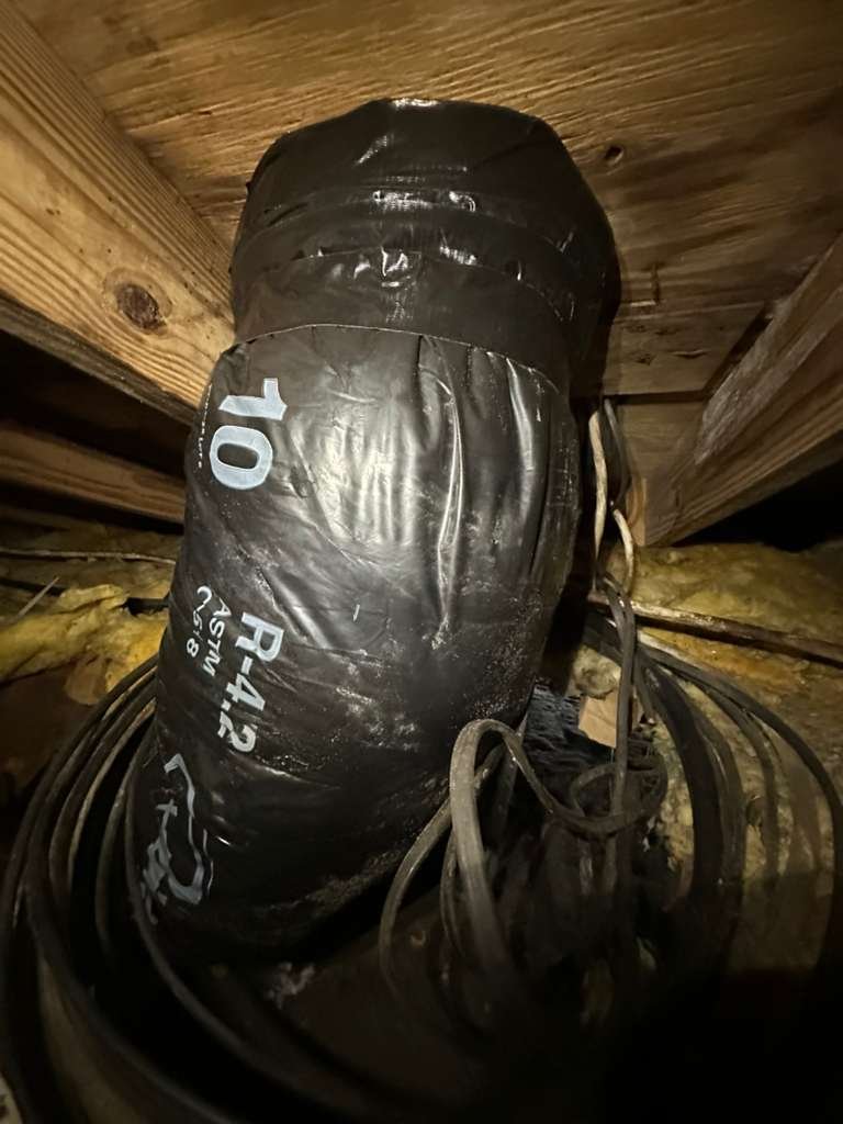 R4.2 ductwork in crawl space with visible labeling in Plant City, FL 33565.