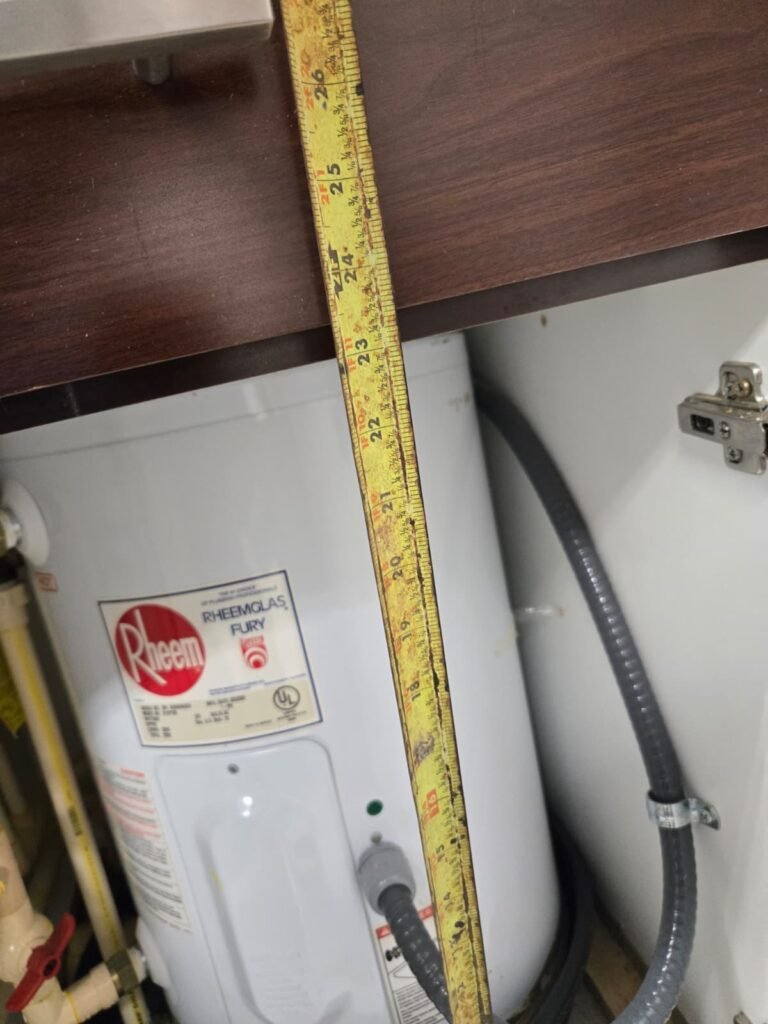 Measuring tape next to water heater in Land O' Lakes, FL 34638