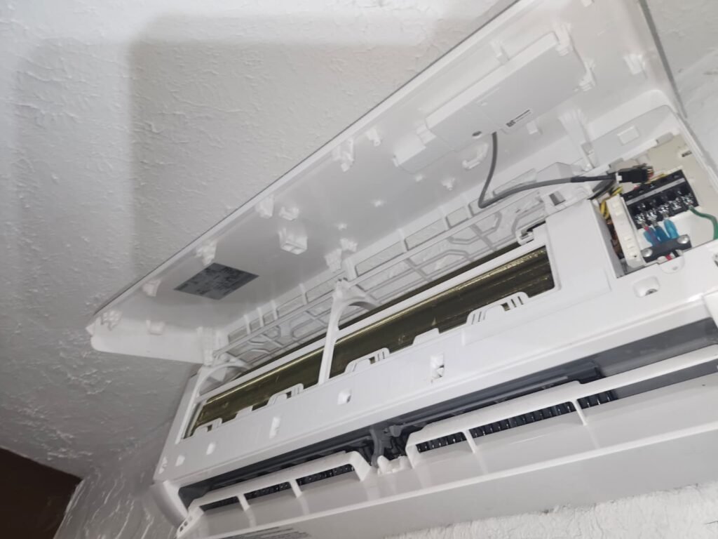 A mini-split indoor unit opened up for service in Tampa, FL 33617.