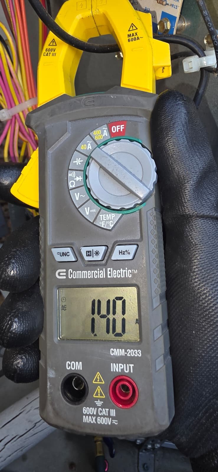 Close-up of multimeter showing electrical readings in Lutz, FL 33559 during Visit #4.