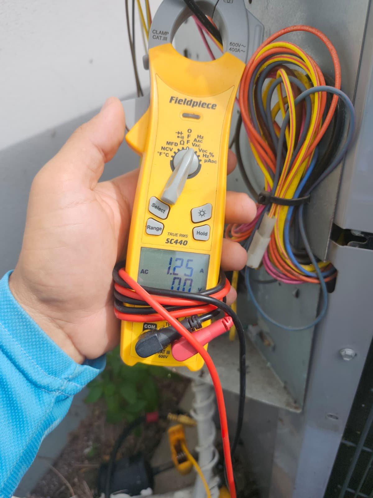 Multimeter Use - St. Petersburg, FL 33712 Using multimeter on AC unit, St. Petersburg, FL 33712.