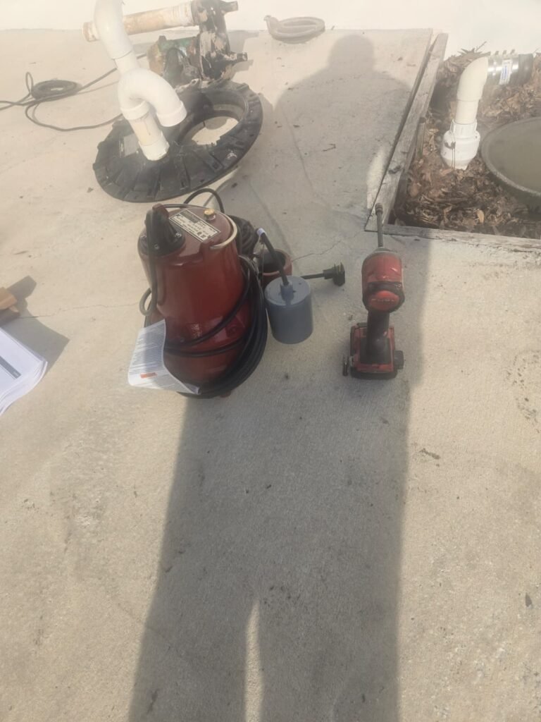 A new submersible pump next to the tools for its install in Tampa, FL 33634.
