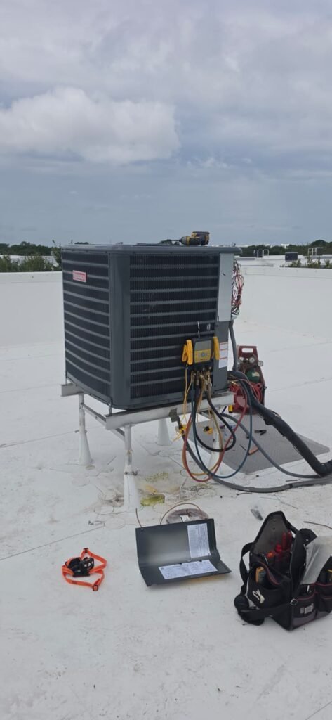 New Rooftop HVAC Unit Installation in Tampa, FL 33611 New rooftop HVAC unit installed with tools nearby, Tampa, FL 33611