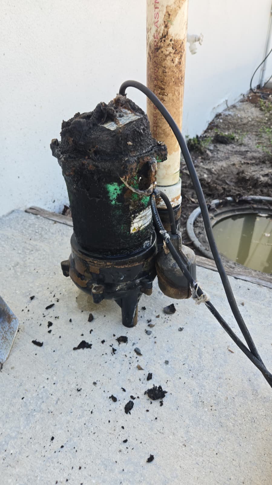Old Pump Removal - Tampa, FL 33634 Old submersible sewage pump removed from site in Tampa, FL 33634.