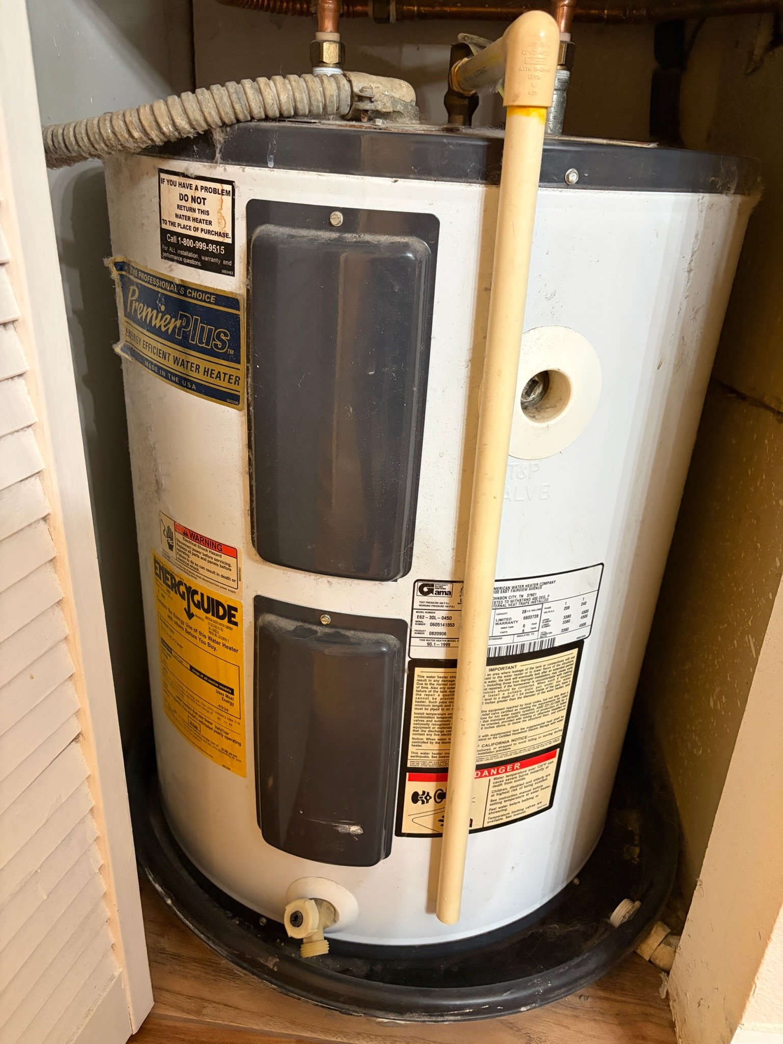Old Water Heater in Tampa, FL 33615 Old water heater in a closet space, Tampa, FL 33615. Before installation.