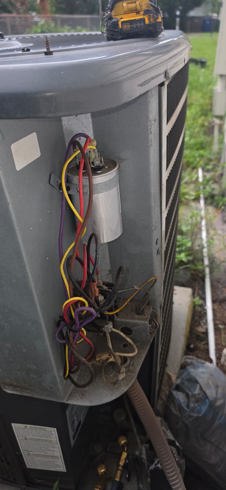 Outdoor AC Unit Wiring - Tampa, FL 33612 Outdoor AC unit with exposed wiring and components in Tampa, FL 33612.