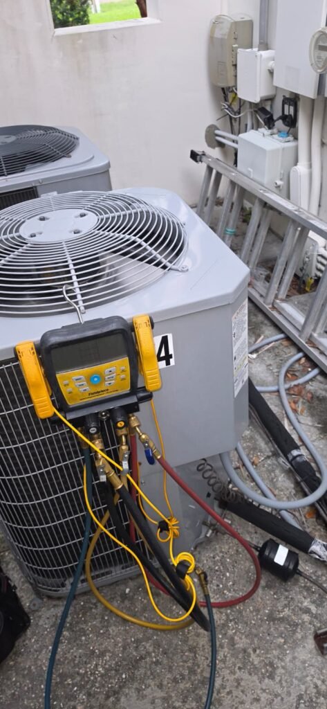 Outdoor HVAC unit with gauges in Tampa, FL 33618