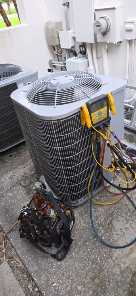 Outdoor HVAC unit with gauges in Tampa, FL 33618