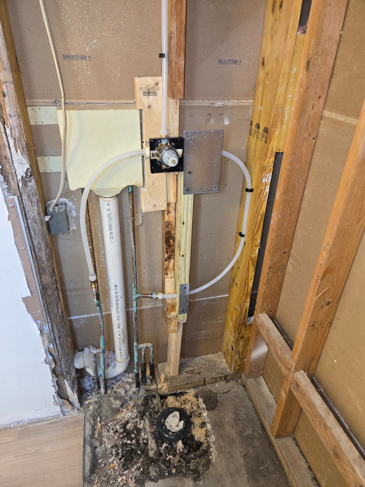 Plumbing installation with structural elements in Tampa, FL 33624.