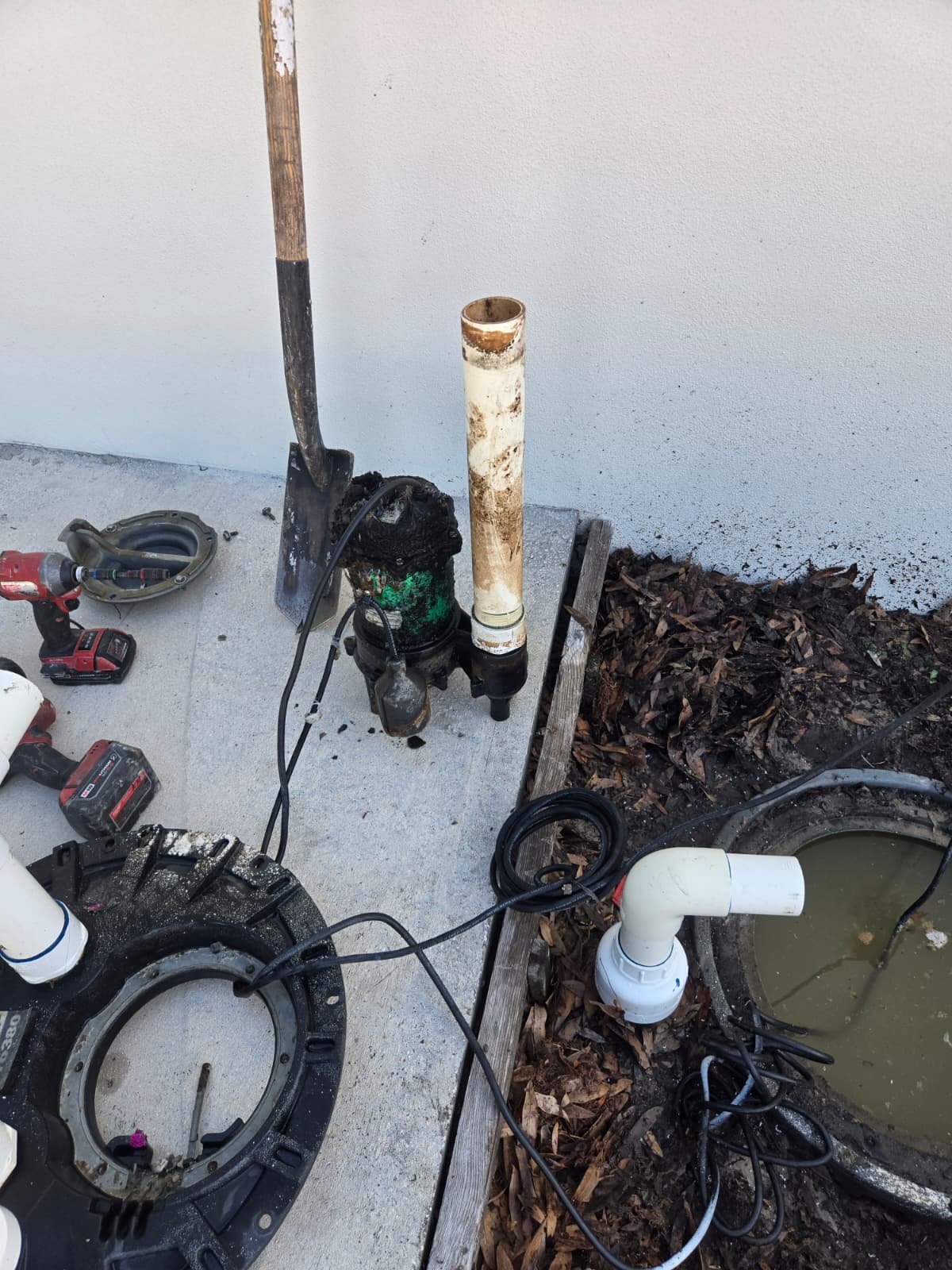 Preparation for Pump Installation - Tampa, FL 33634 Area prepared for sewage pump installation with tools in Tampa, FL 33634.