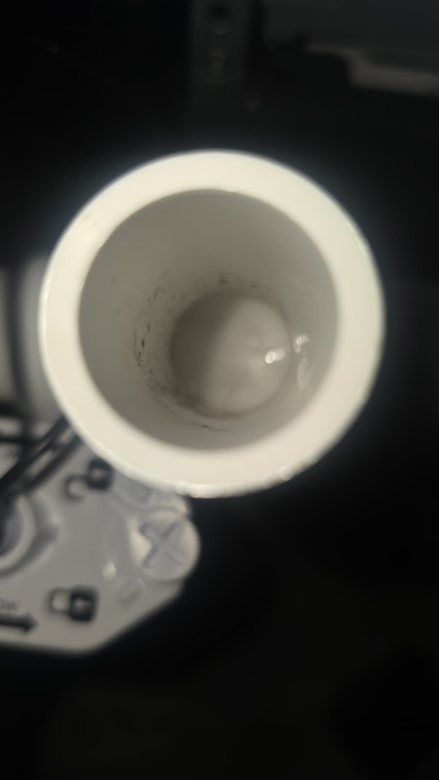 Close-up of PVC pipe opening with dirt in Tampa, FL 33614. Detail of small repair.