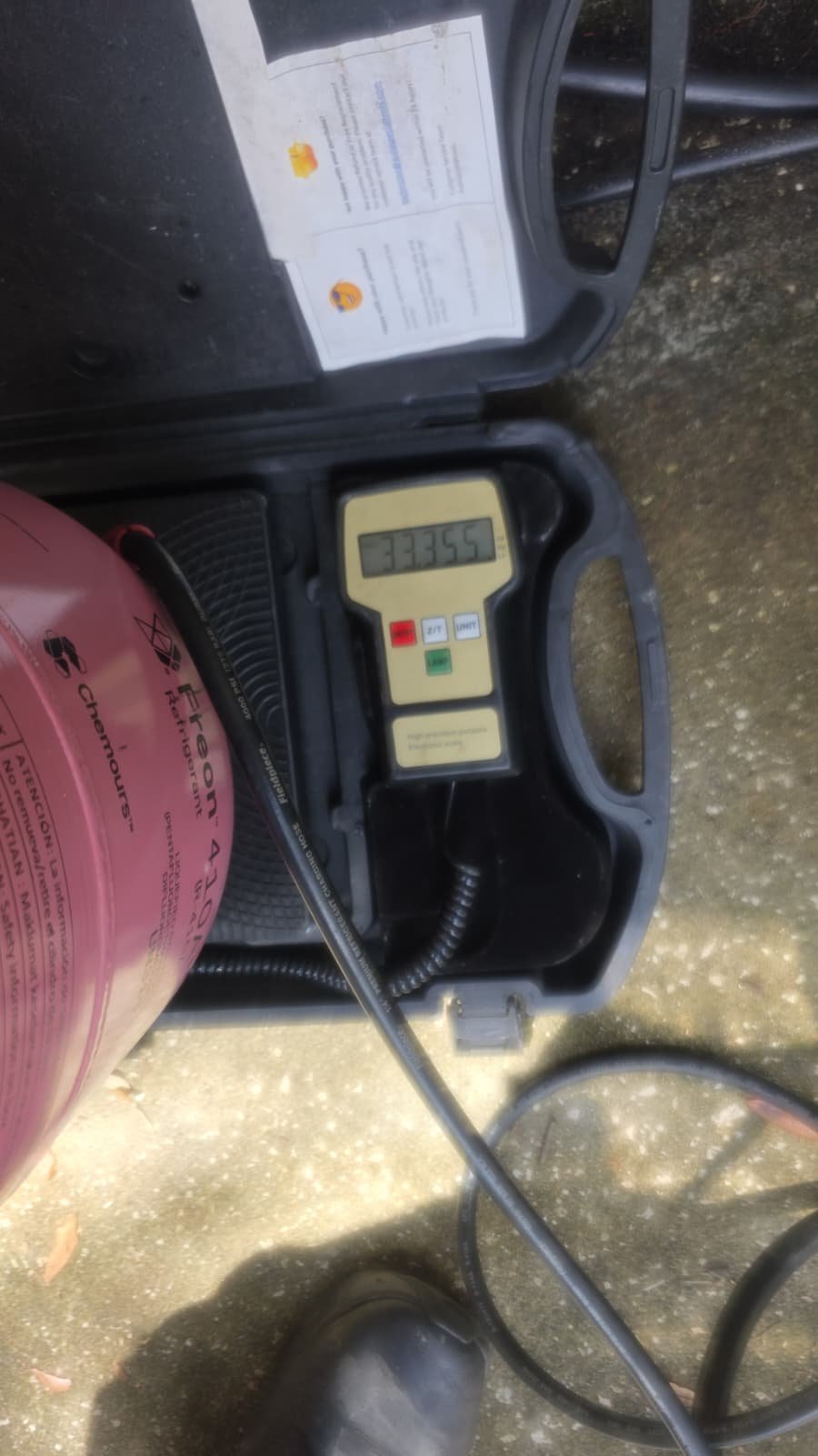 R410A Refrigerant Tank on Scale - New Port Richey, FL 34655 R410A refrigerant tank on scale showing weight in New Port Richey, FL 34655.