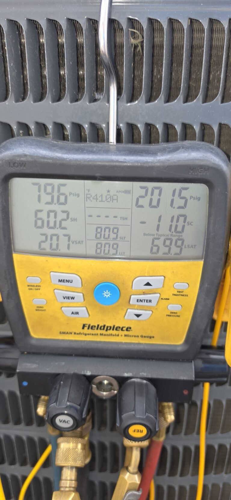 Digital gauge showing refrigerant levels in Tampa, FL 33610