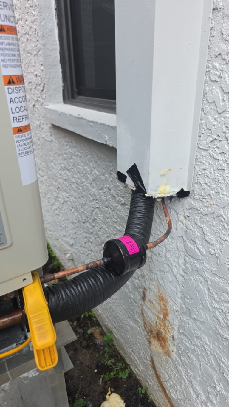 Refrigerant Line Detail in Tampa, FL 33635 Refrigerant line and wall penetration in Tampa, FL 33635