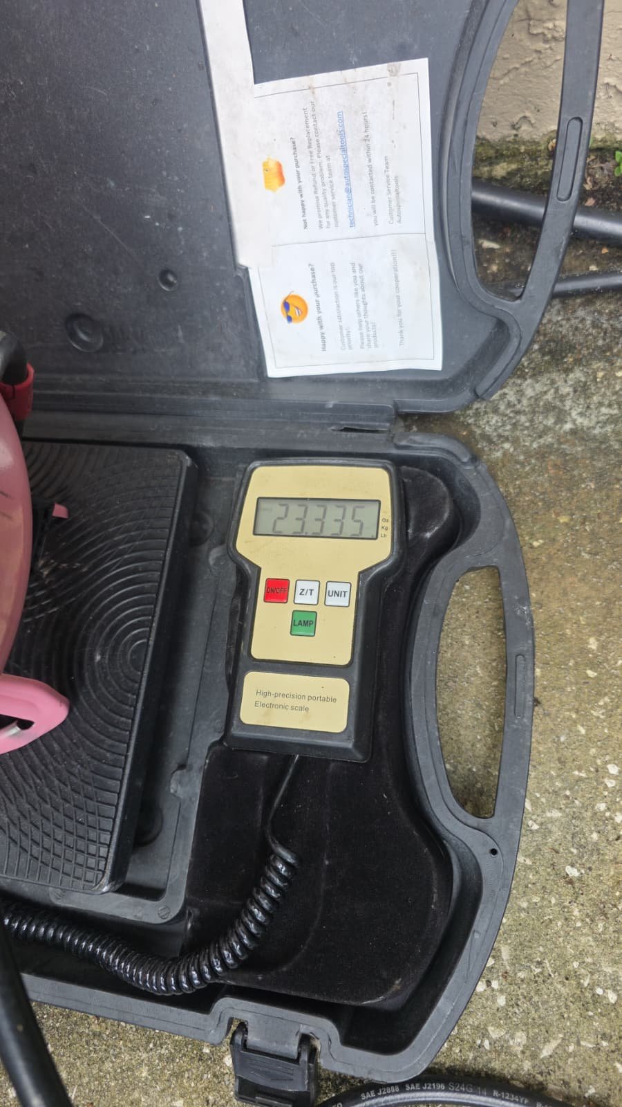 Refrigerant Tank Weight - New Port Richey, FL 34655 Digital scale showing weight of refrigerant tank in New Port Richey, FL 34655.