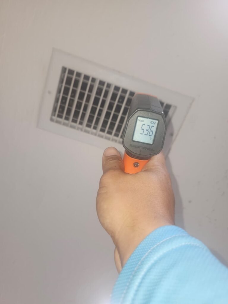 Temperature Gun Reading in Clearwater, FL 33764 Temperature gun reading near air vent in Clearwater, FL 33764