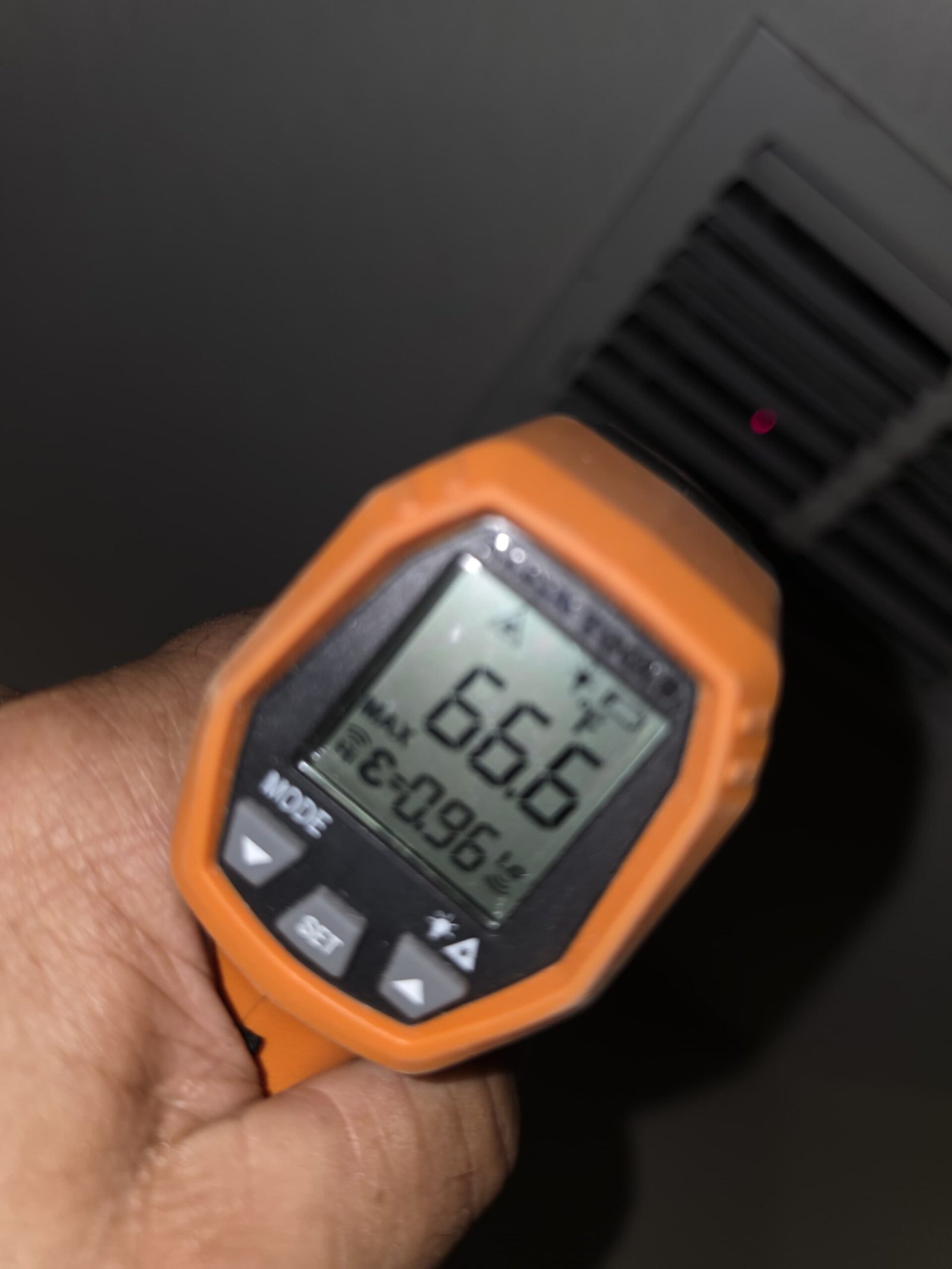 Temperature Reading - Tampa, FL 33625 Infrared thermometer showing temperature reading near a vent in Tampa, FL 33625. Accurate measurement.
