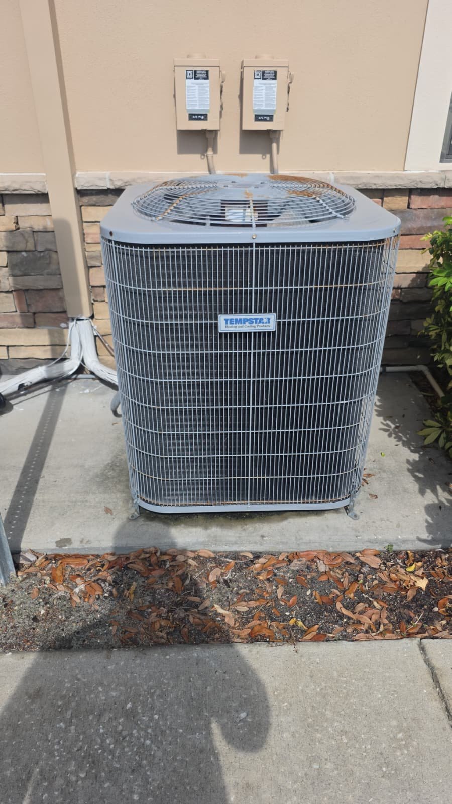 Tempstar AC Installation New Port Richey, FL 34655 Newly installed Tempstar AC unit on concrete pad in New Port Richey, FL 34655.