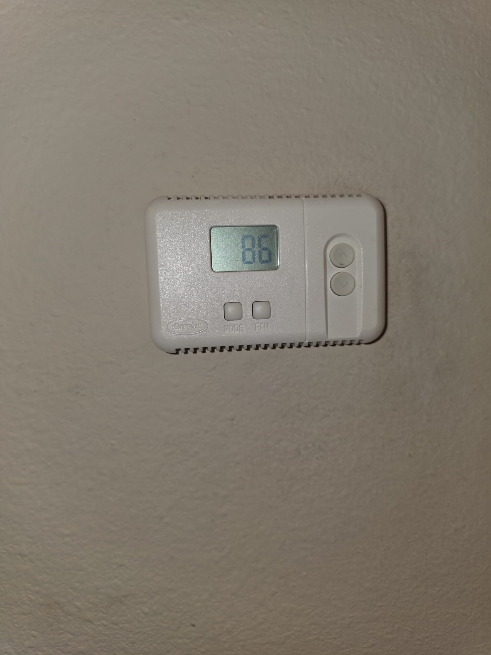 Thermostat Display - Tampa, FL 33625 Wall-mounted thermostat displaying temperature in Tampa, FL 33625. Precise climate control.