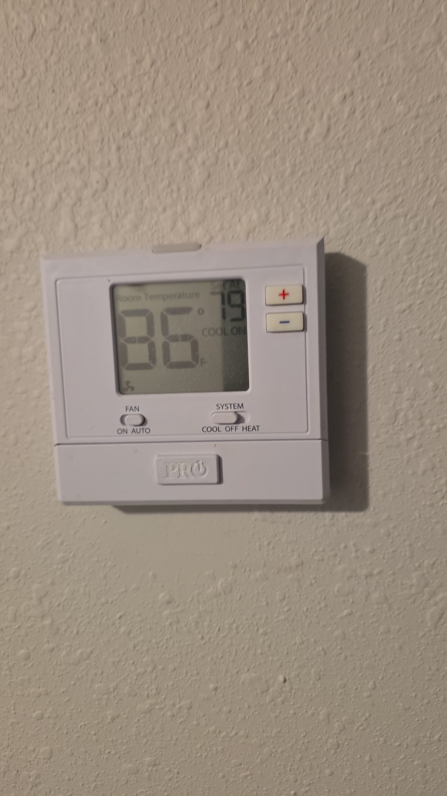 Digital thermostat showing temperature in Largo, FL 33774.