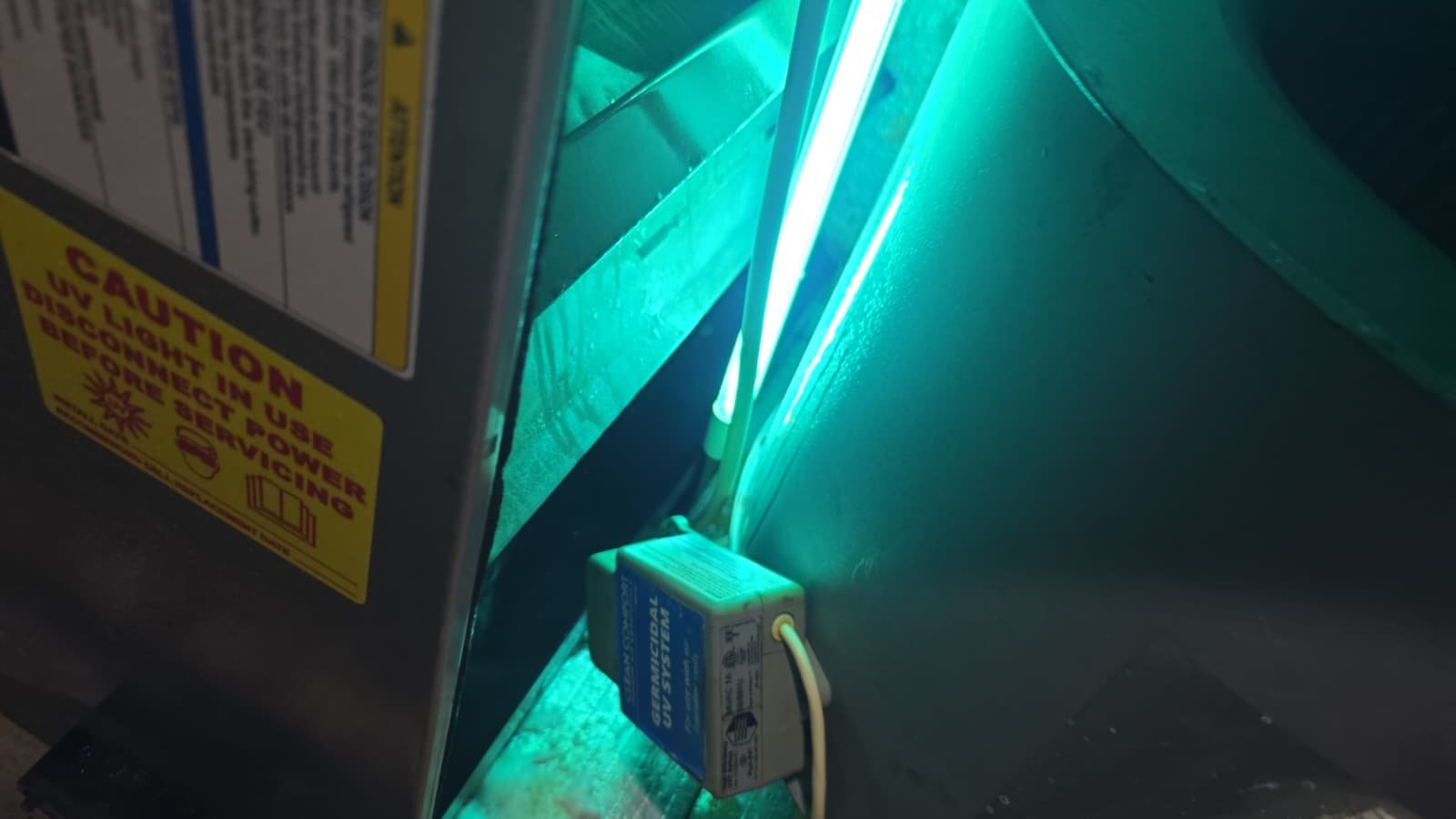 UV light installed in HVAC system for air purification during Premium Therapy Plan in Tarpon Springs, FL 34689.