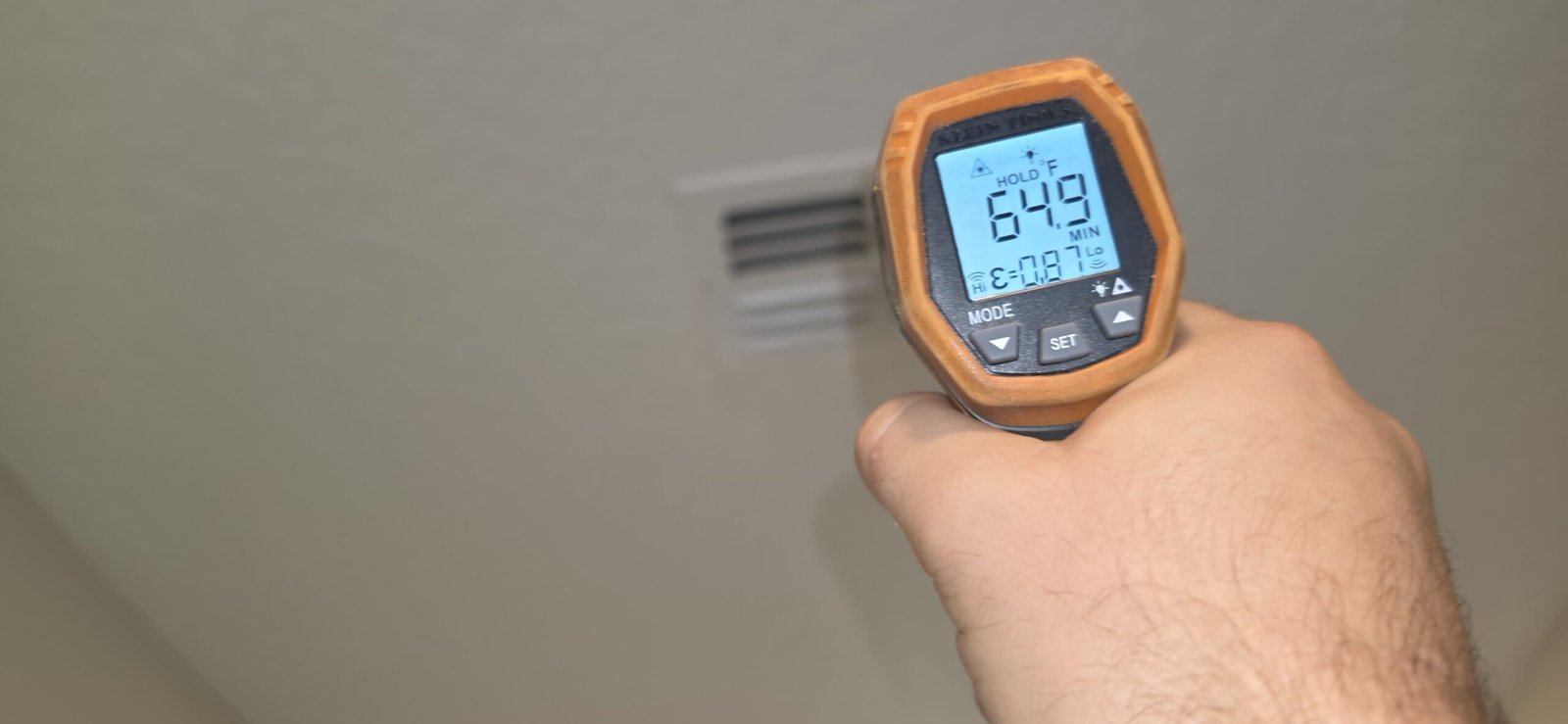 Vent Temperature Check - Spring Hill, FL 34609 Temperature reading at vent with handheld device in Spring Hill, FL 34609.