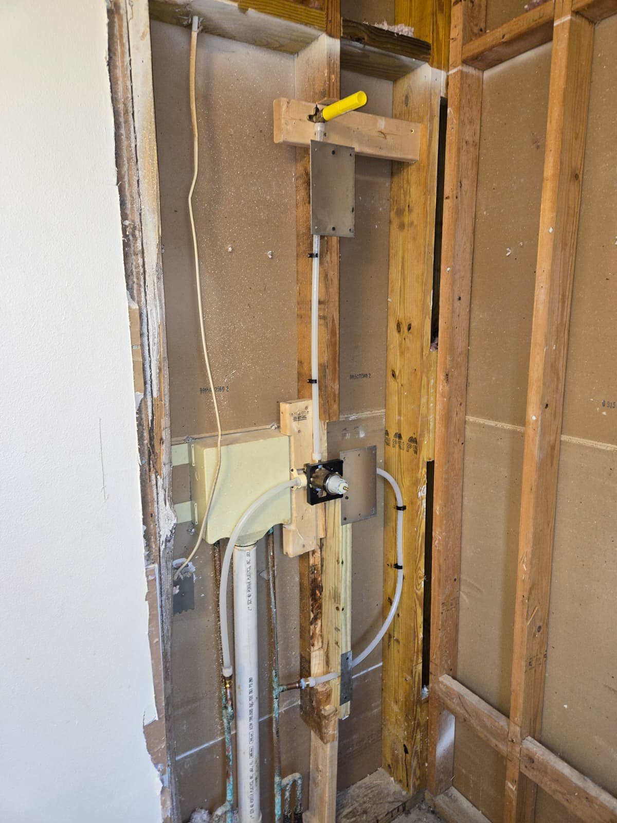Visible pipes and mounting hardware in Tampa, FL 33624.