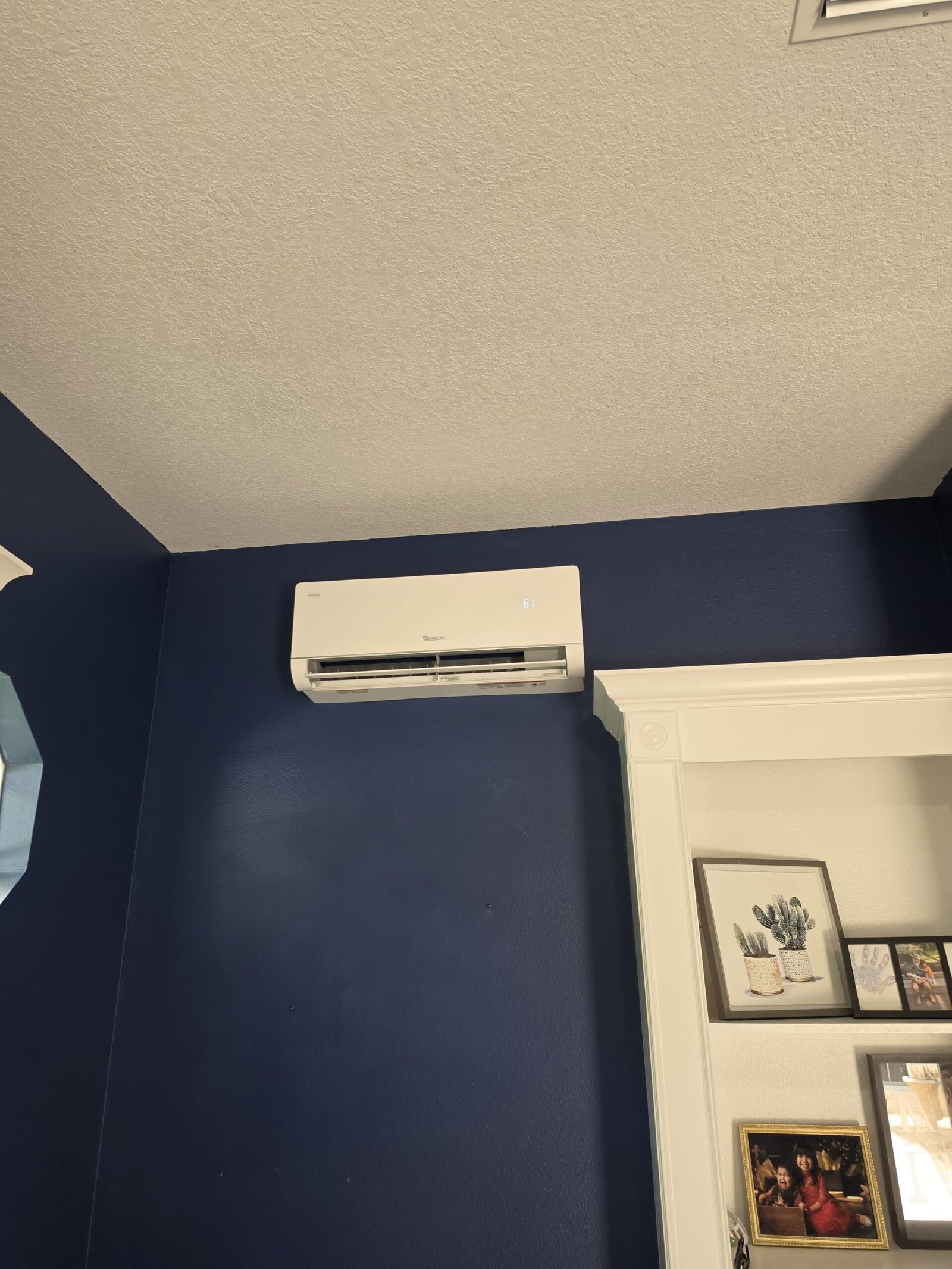 Wall-mounted indoor AC unit in a room, Lutz, FL 33558.