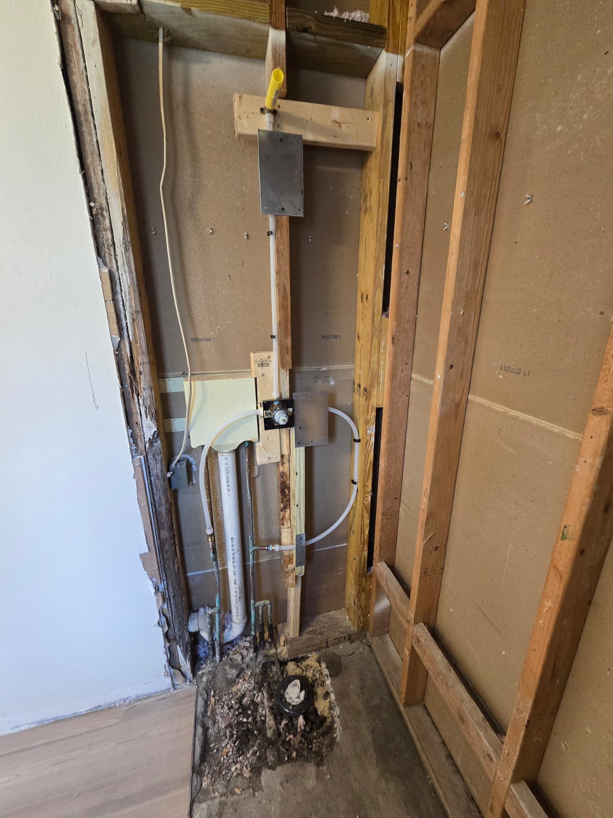 Exposed wall with plumbing in Tampa, FL 33624.