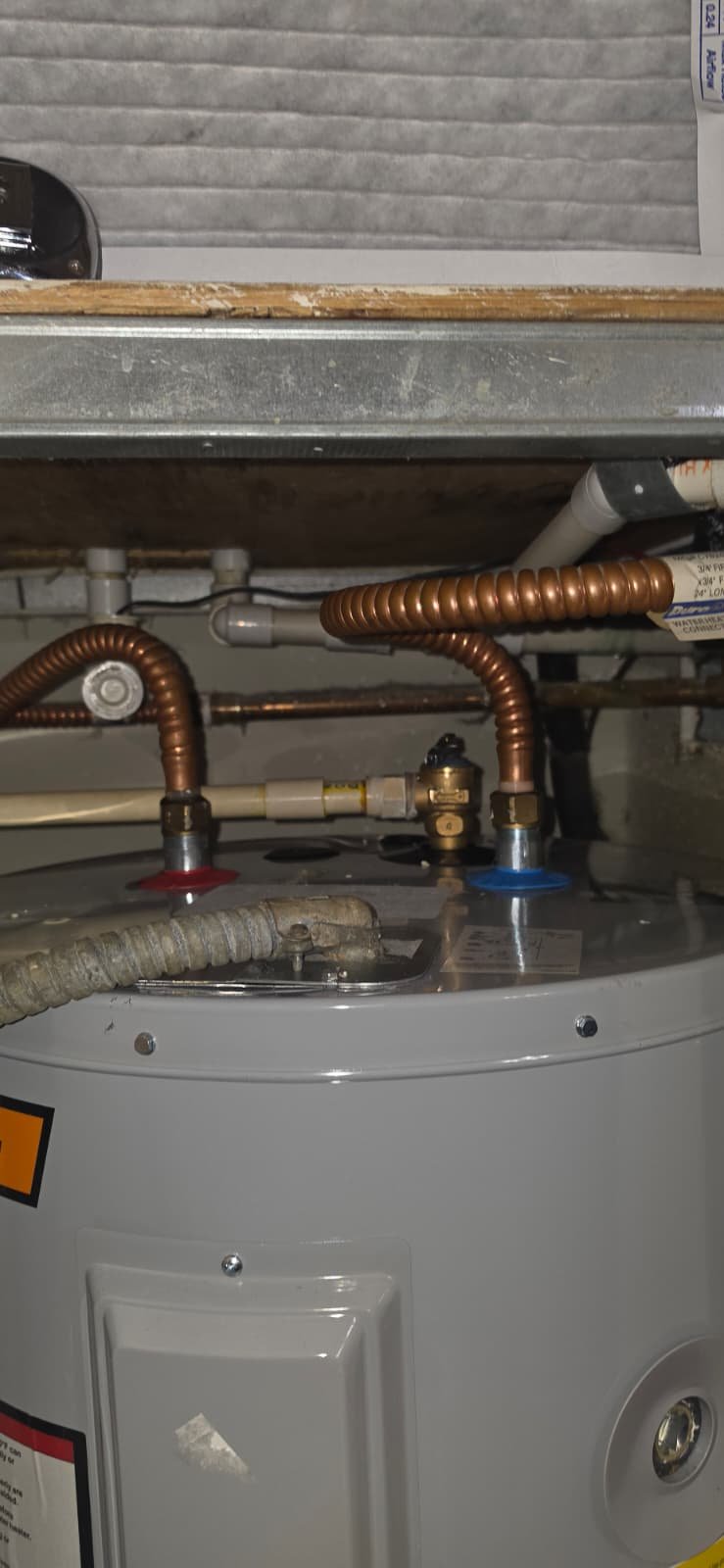 Water Heater Connections in Tampa, FL 33615 Close-up of water heater connections in Tampa, FL 33615. Detailed installation view.