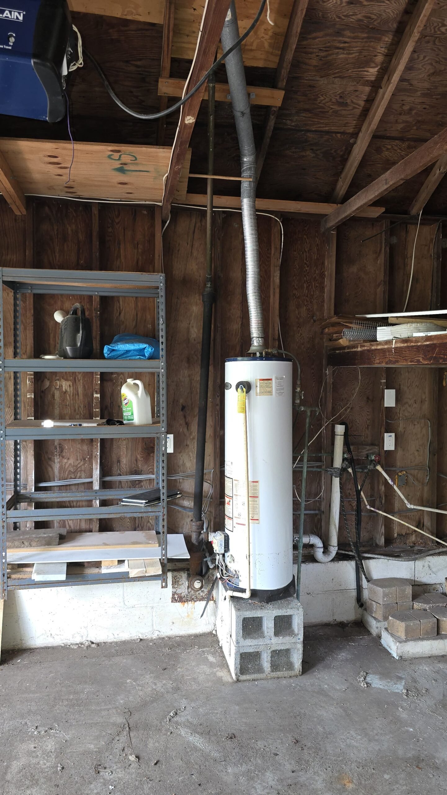 Water Heater in Garage, Gulfport, FL 33707 Water heater with surrounding garage storage in Gulfport, FL 33707.