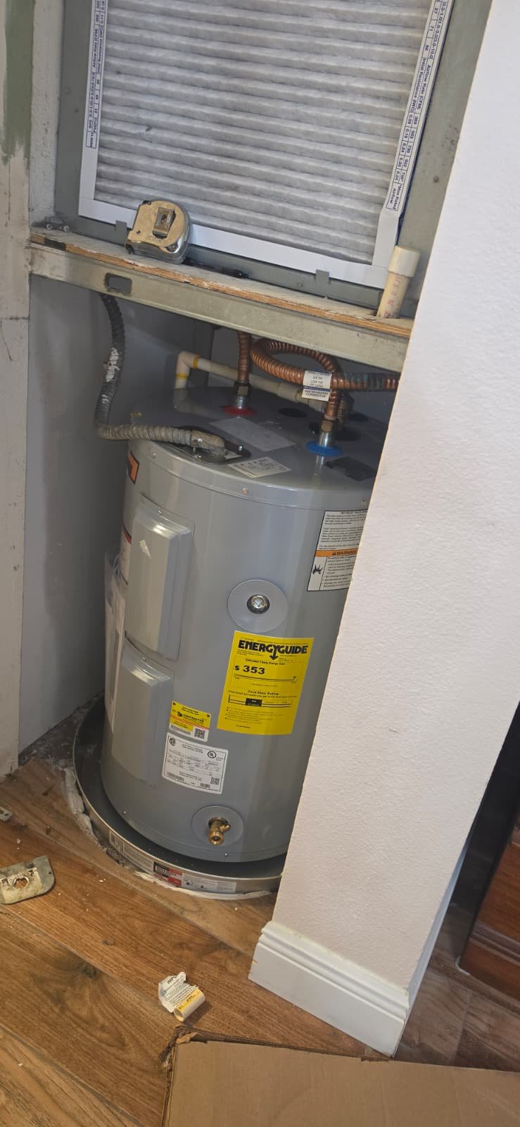 Water Heater with Piping in Tampa, FL 33615 New water heater with visible piping in Tampa, FL 33615. Expert installation.