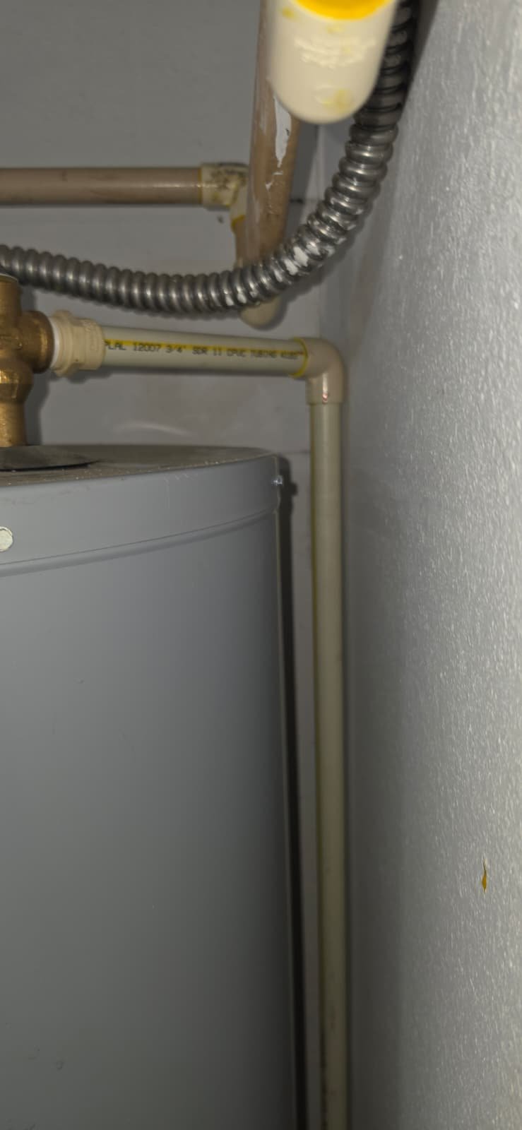 Water Heater Plumbing - Tampa, FL 33626 Detailed plumbing pipes on water heater, Tampa, FL 33626.
