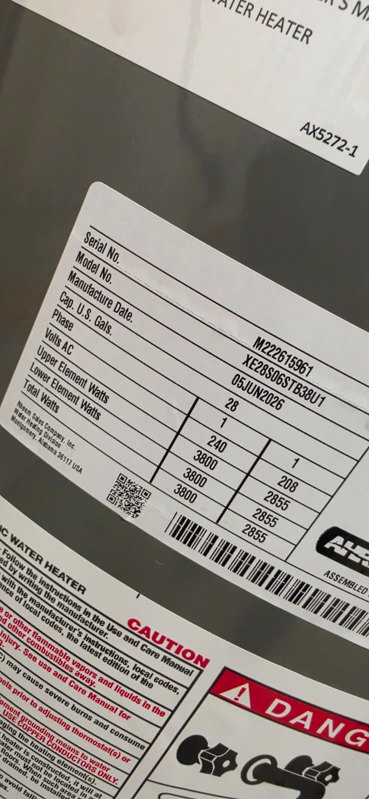 Close-up of water heater label with specs in Port Richey, FL 34668. Safety and efficiency details.